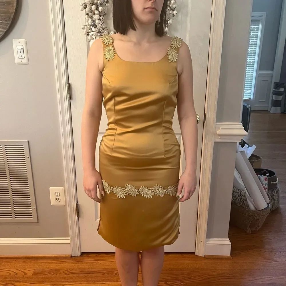 TheΒ Original Design Studio Gold Satin AppliquΓ© Open Back Dress. Szβ6